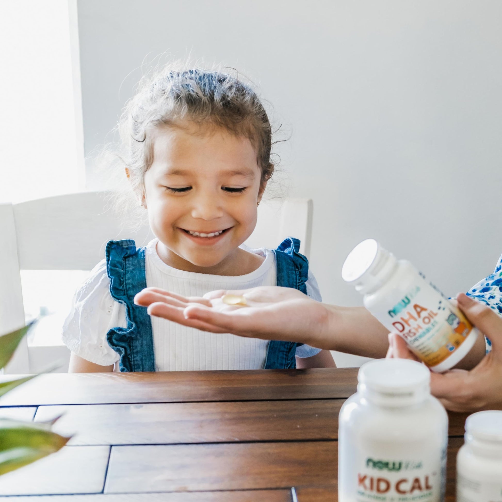 Close up of kid friendly fruit flavored DHA softgels demonstrating easy to chew texture