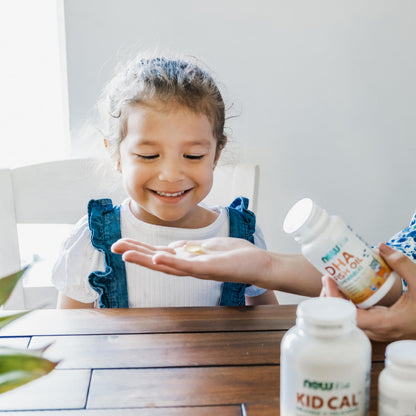 Close up of kid friendly fruit flavored DHA softgels demonstrating easy to chew texture