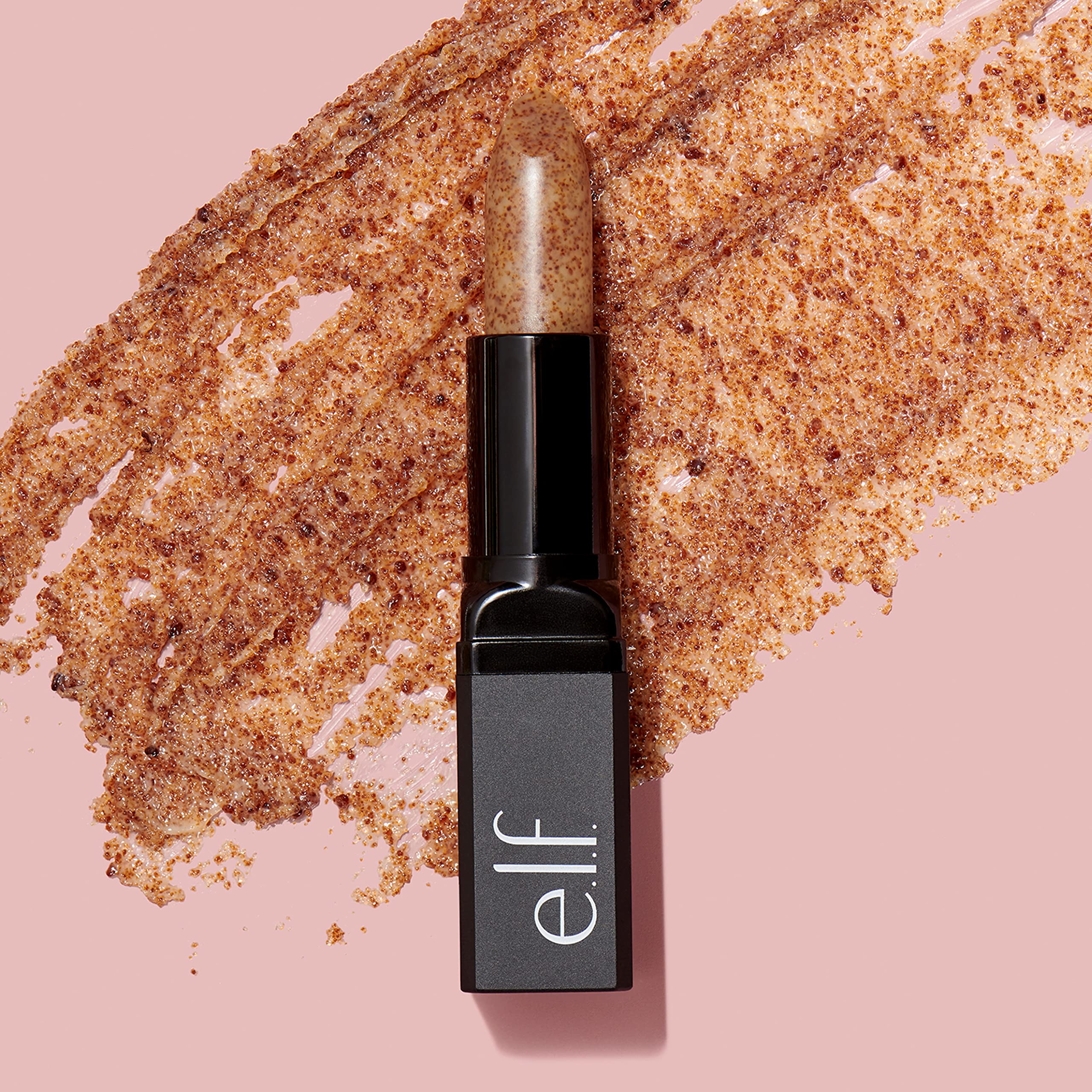 Close up of E.l.f. brown sugar lip scrub on lips
