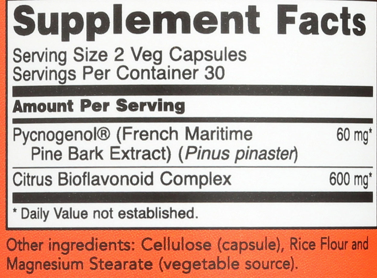 Close-up of the non-GMO and vegan certification badges on the NOW Foods Pycnogenol 60 vegetable capsules bottle