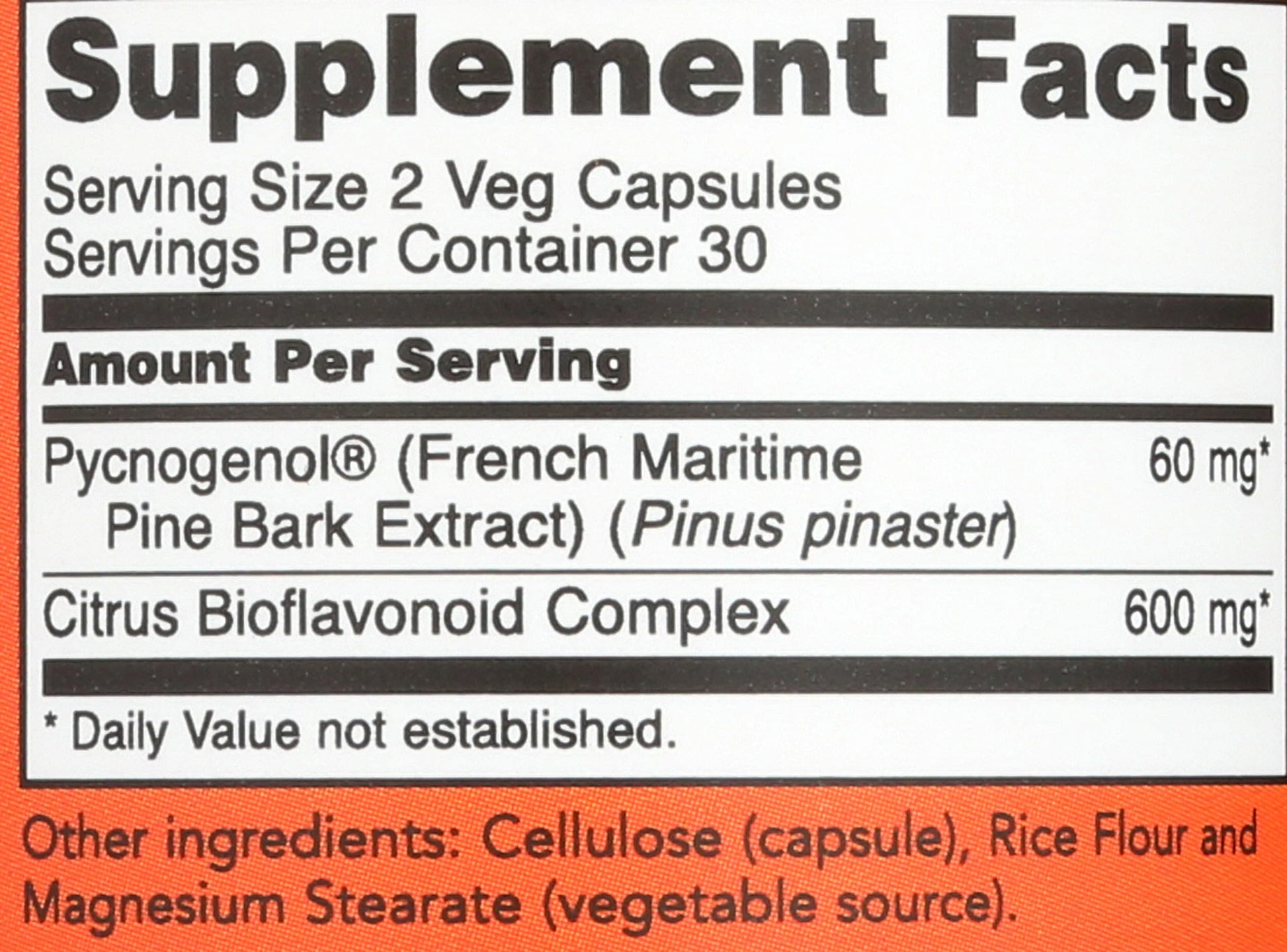 Close-up of the non-GMO and vegan certification badges on the NOW Foods Pycnogenol 60 vegetable capsules bottle