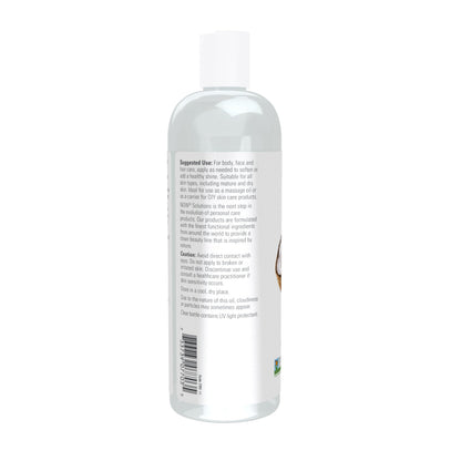 Now Foods Liquid Coconut Oil clear texture demonstration on skin