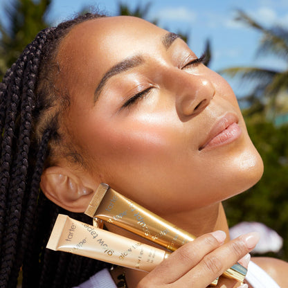 Tarte Glow Tape vegan highlighter on beauty vanity setup
