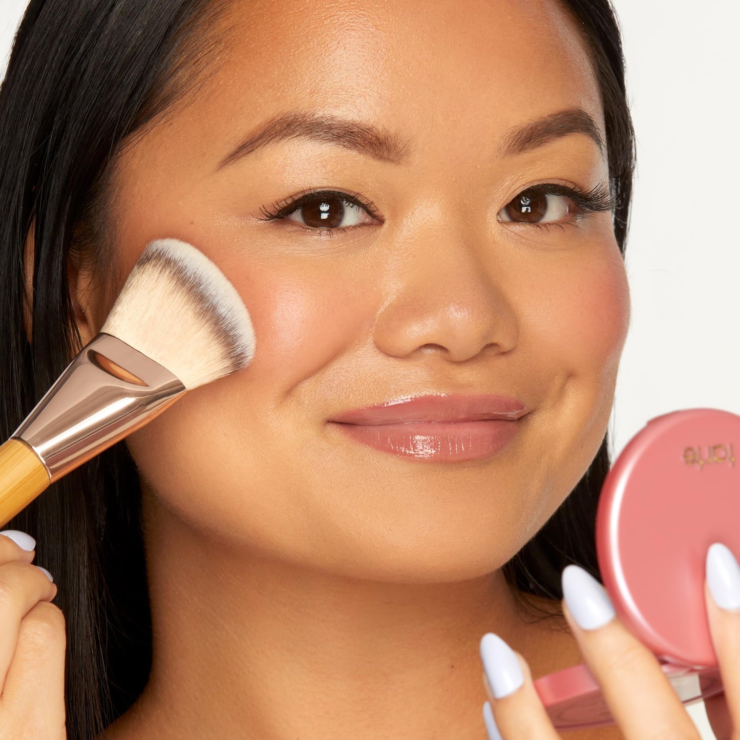 Tarte Amazonian clay oil control blush compact closed displaying the embossed brand logo.