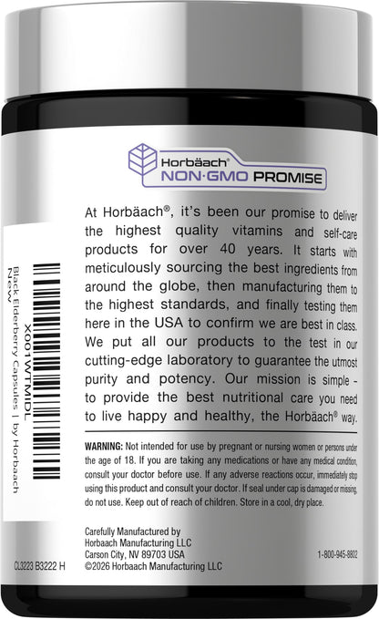 Premium quick release black elderberry capsules spilled next to the supplement bottle