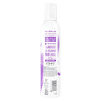 Dove Rice Milk and Velvet Açaí shower foam texture on palm
