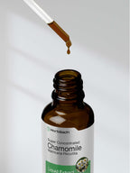 Premium Horbäach holistic health chamomile drops side view showing product certifications.