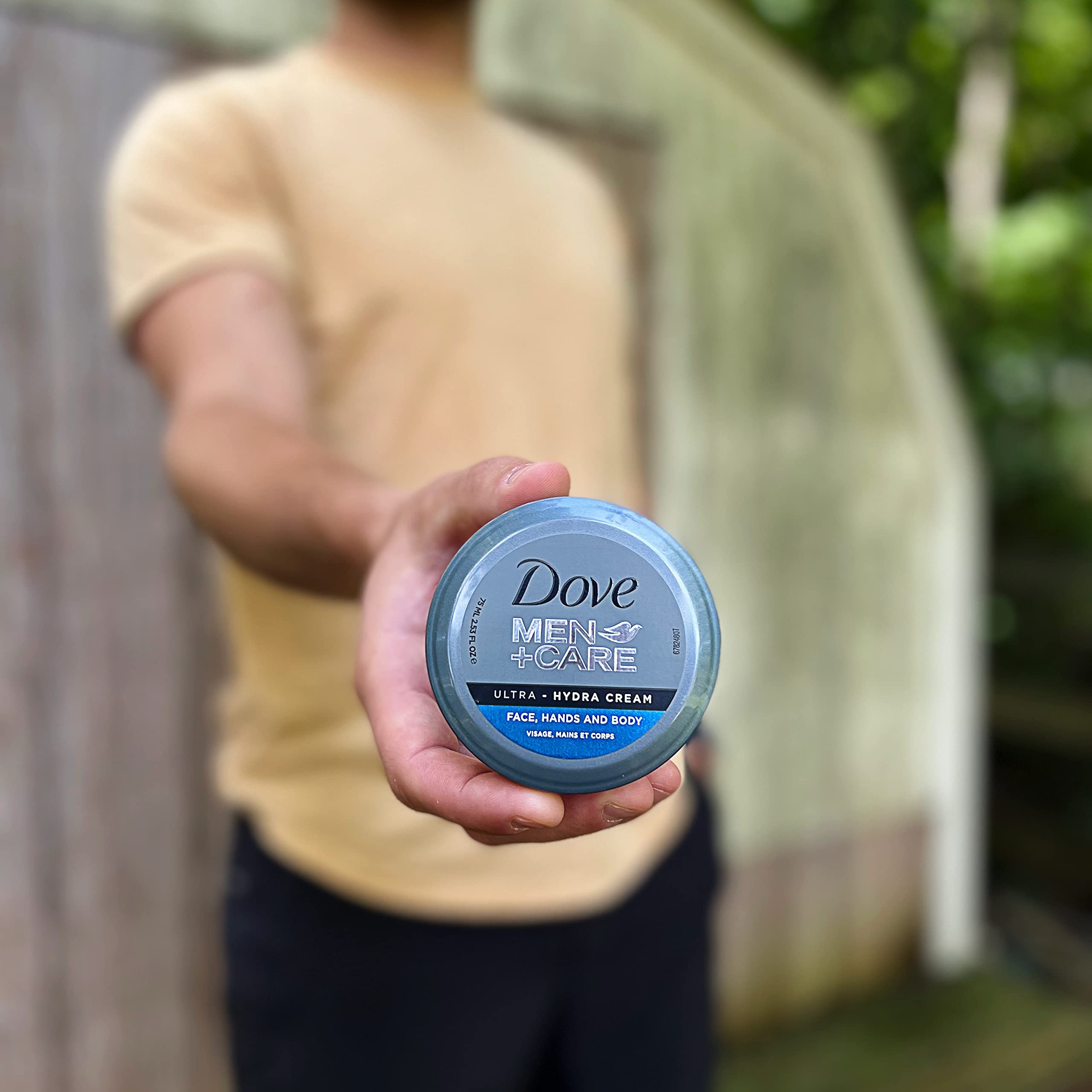 Four pack arrangement of authentic Dove Men Care Ultra Hydra skincare jars.