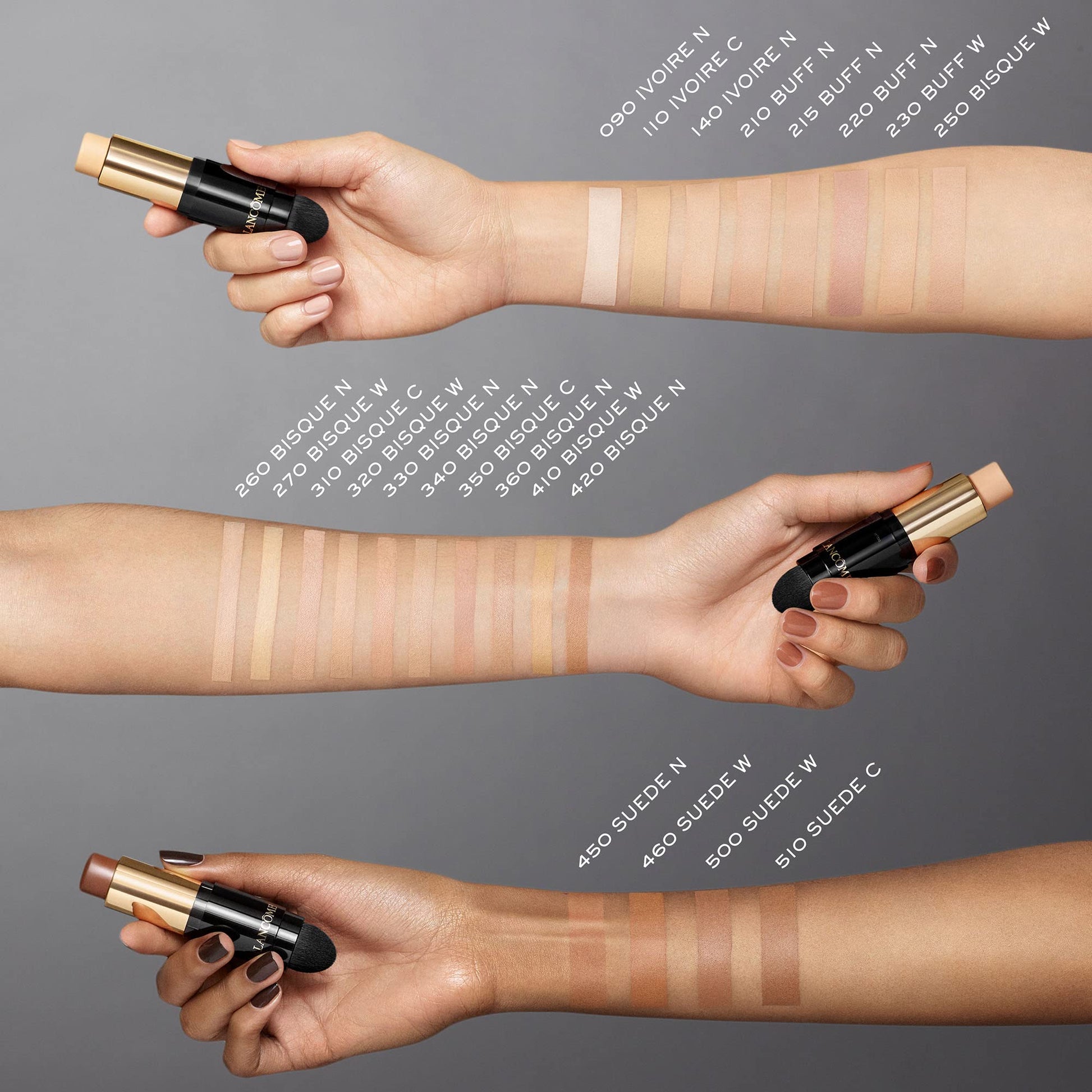 Lancome oil free foundation stick being applied to swatches of different skin tones.