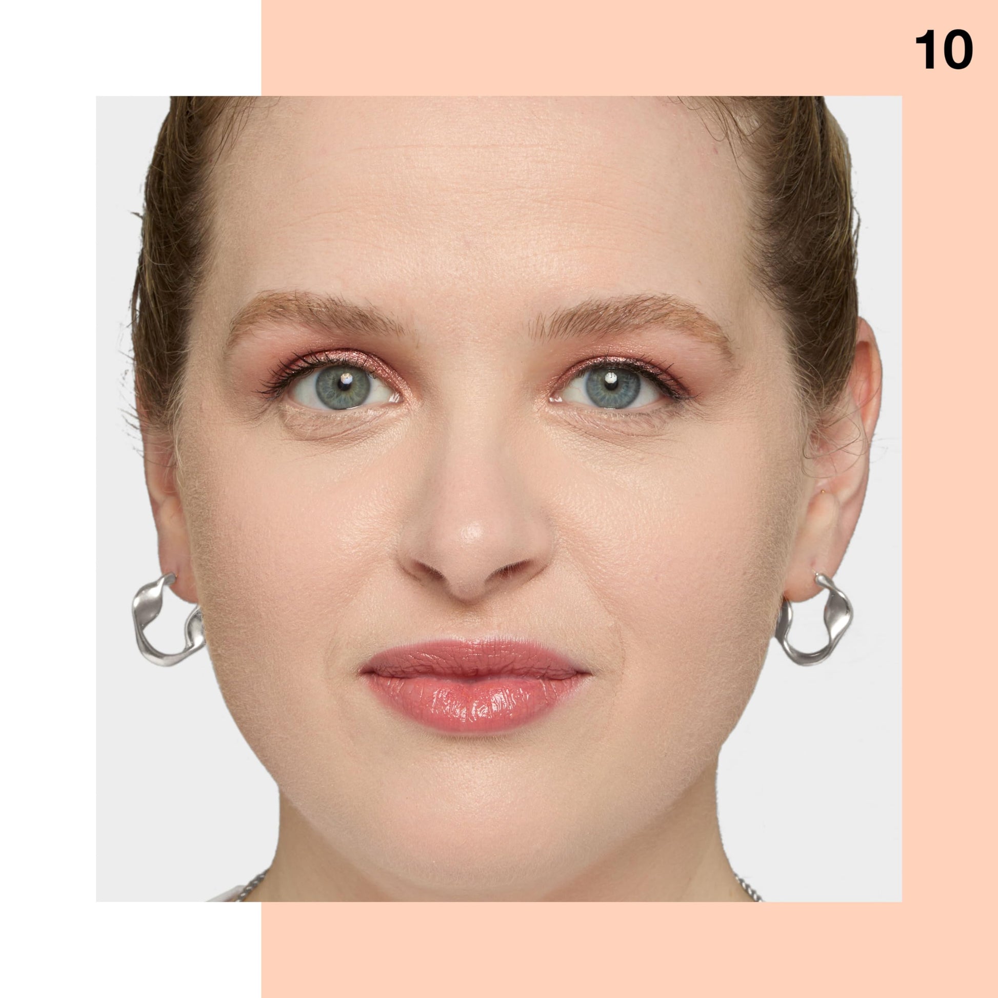 Dermatologist tested non comedogenic blemish coverage liquid makeup tube on a clean background.