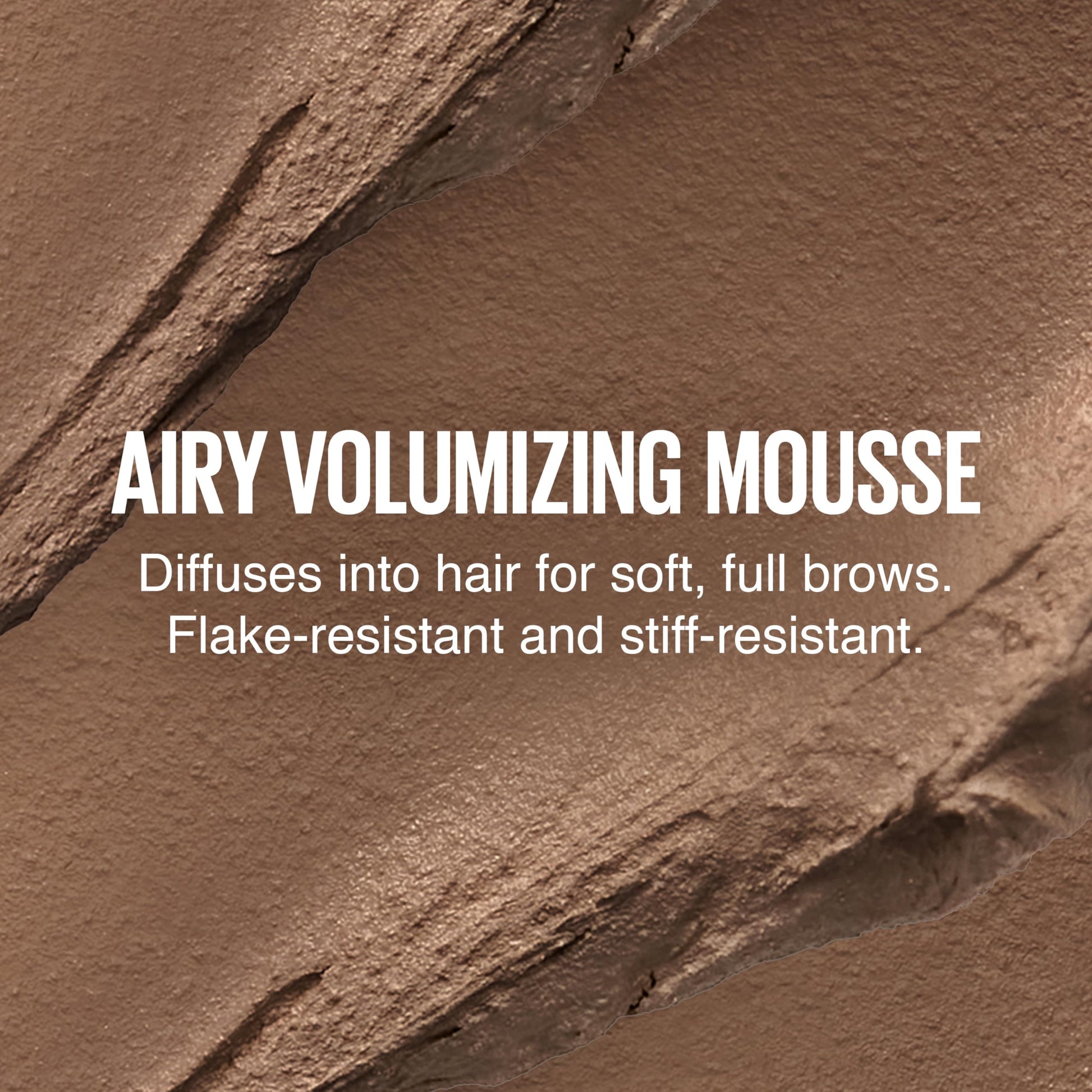 Close-up of the specialized fluff brush designed for lifting and volumizing brow hairs.