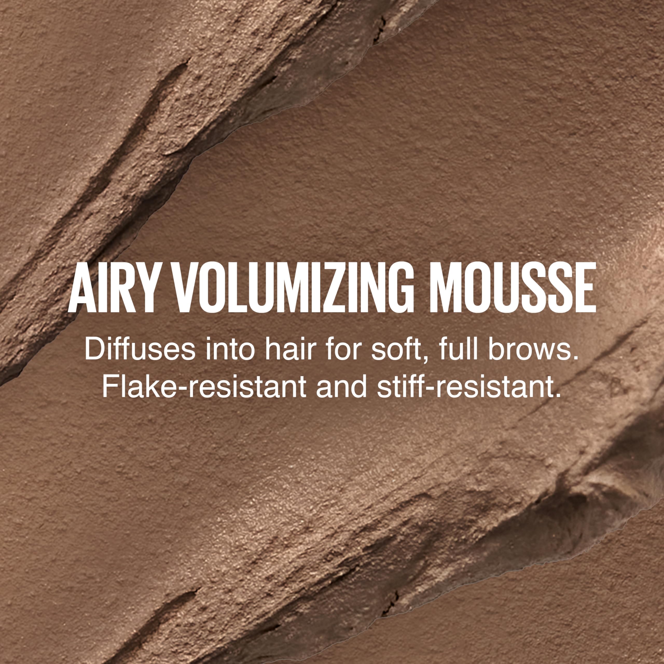 Close-up of the specialized fluff brush designed for lifting and volumizing brow hairs.