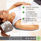 Person using portable acupressure set for back relaxation