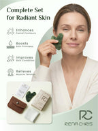 Heart shaped deep green gua sha tool for jawline sculpting.