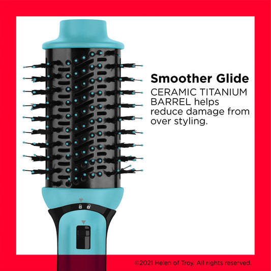 Close up view of the detachable oval brush head and ceramic titanium barrel of the Revlon hot air brush.