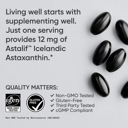 Single red carotenoid softgel capsule from Sports Research Astaxanthin bottle for daily skin and eye support.