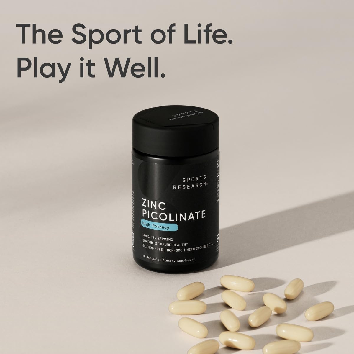 Non-GMO and gluten-free zinc picolinate capsules next to original packaging closure