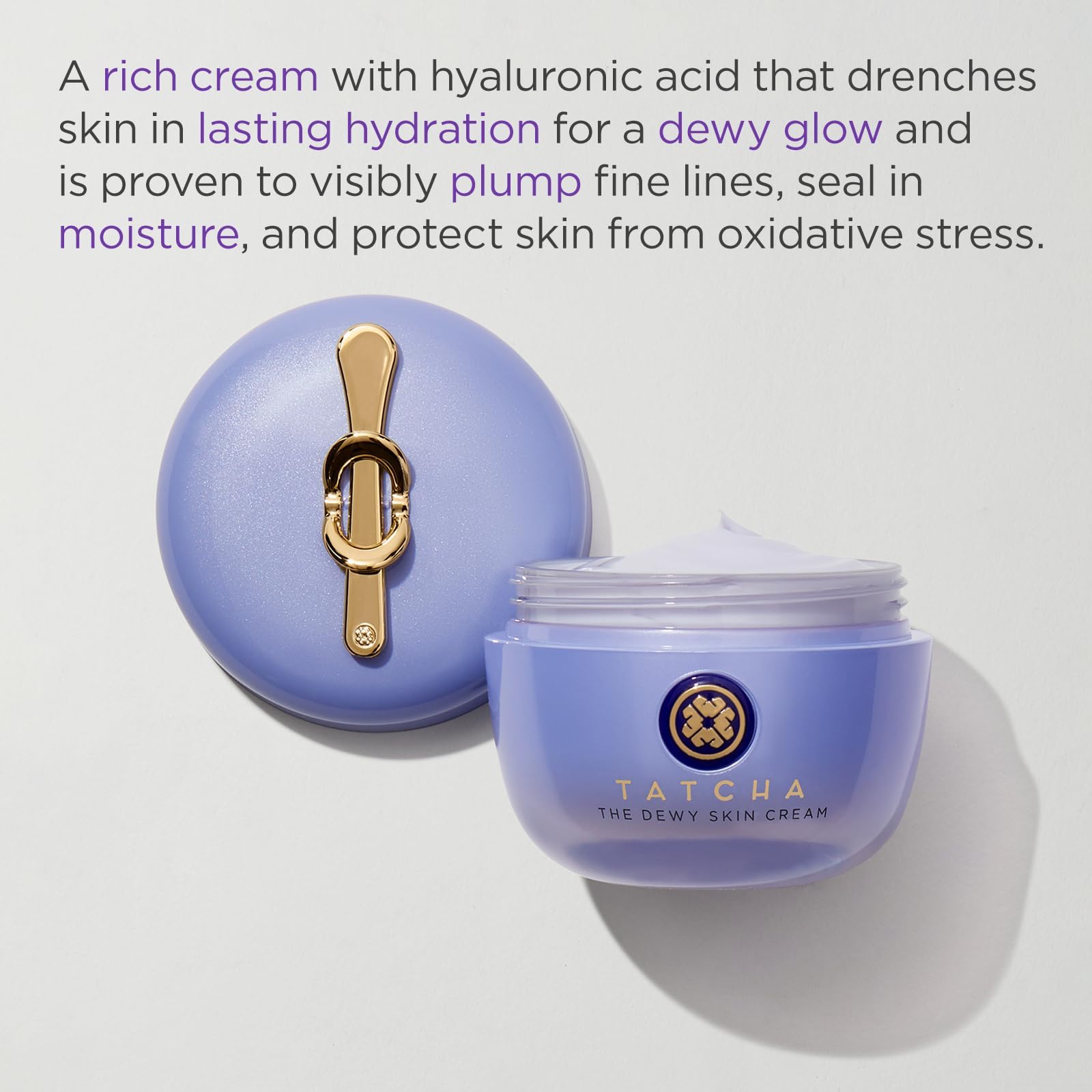 Tatcha luxury anti aging face cream with gold lid handle close up