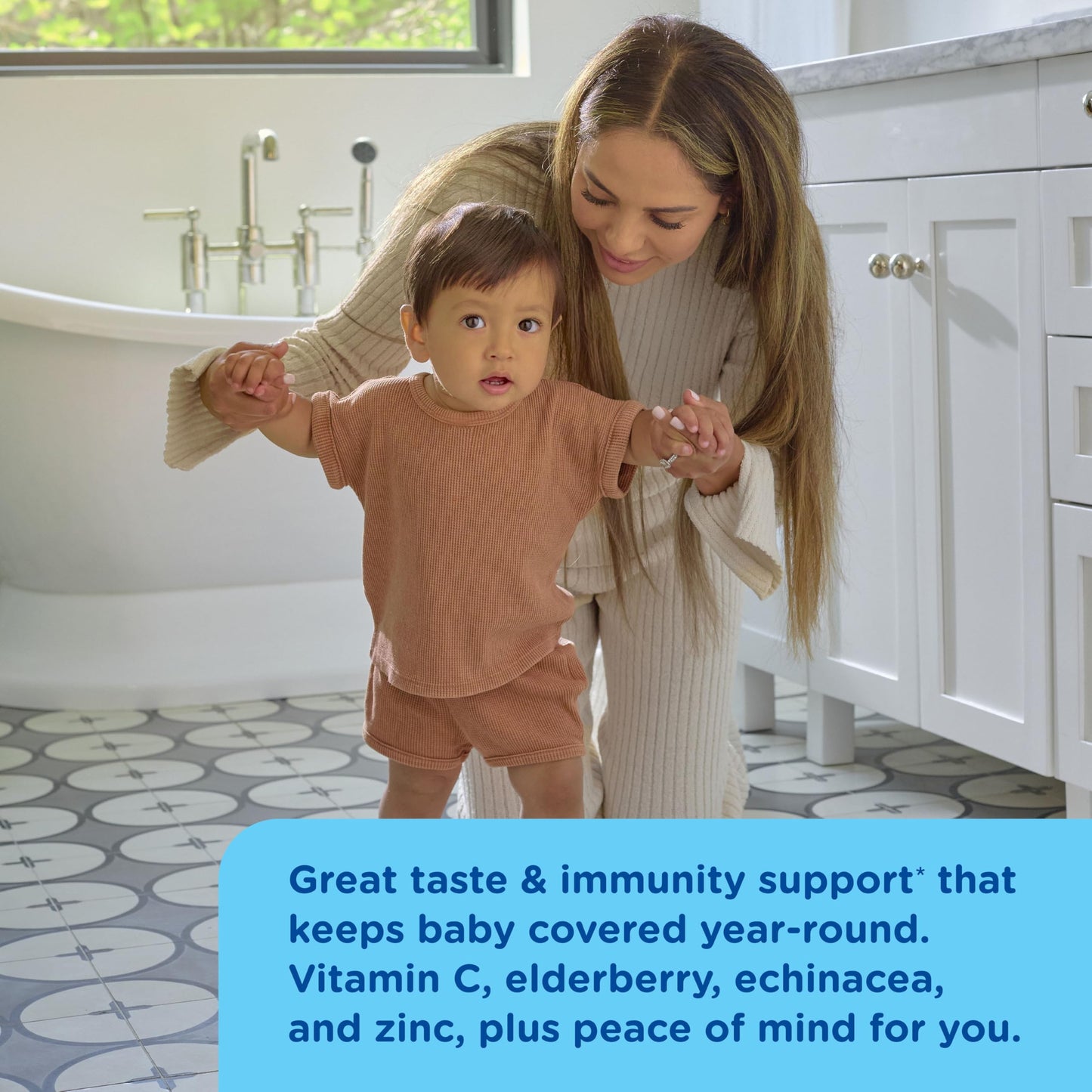 USDA Organic and NSF certification seals visible on the packaging of Mommy's Bliss infant elderberry drops