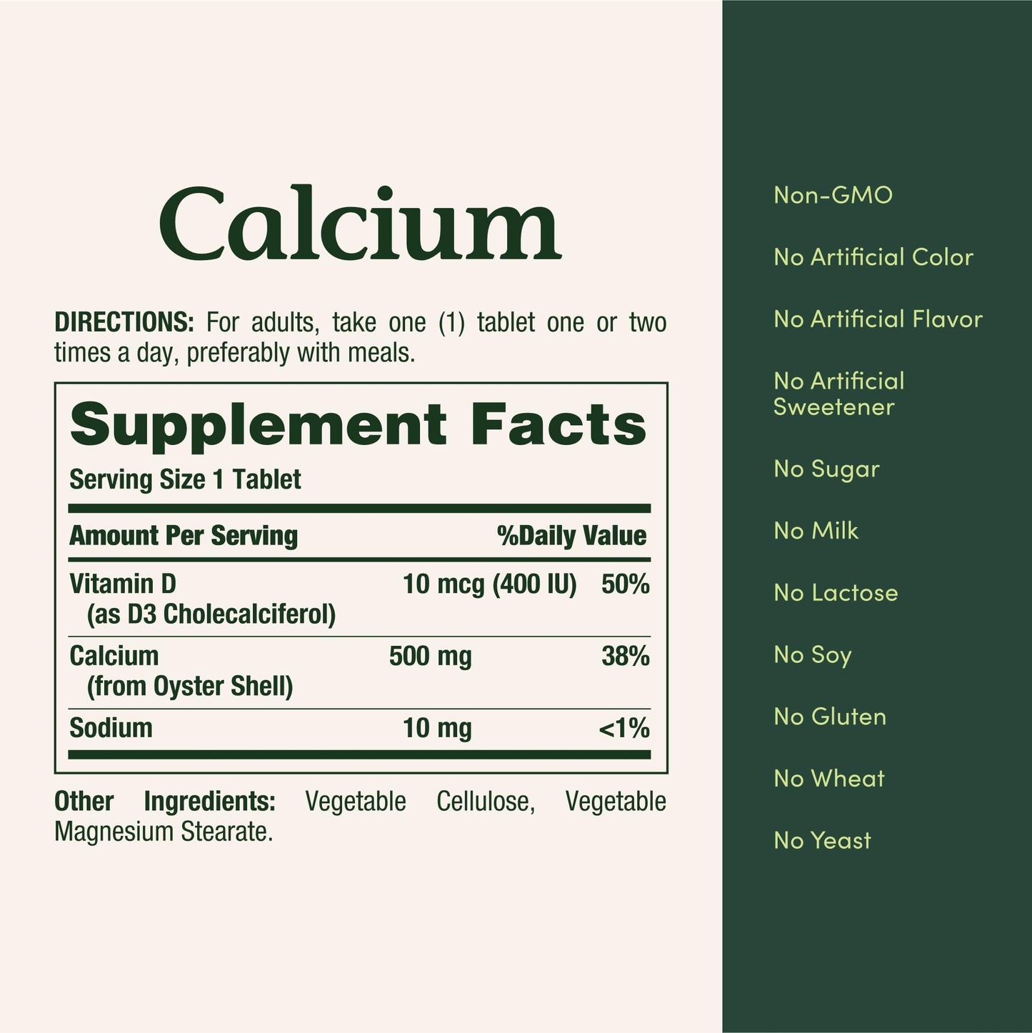 Close up of the round white Nature's Bounty Calcium 500mg tablets showcasing texture and approximate size