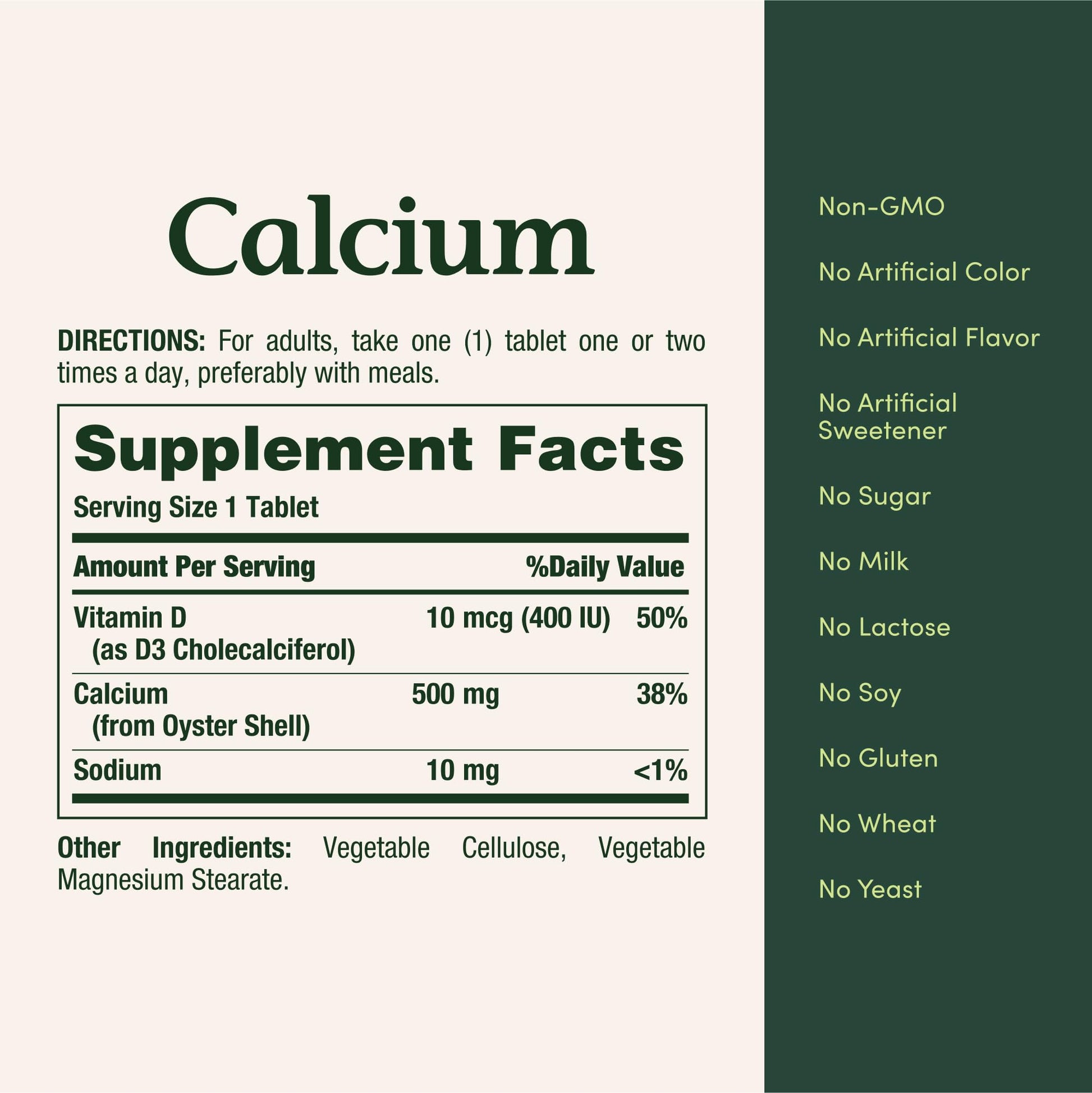 Close up of the round white Nature's Bounty Calcium 500mg tablets showcasing texture and approximate size
