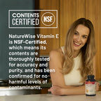 Lifestyle flat lay featuring NatureWise vitamin E bottle for skin and heart wellness