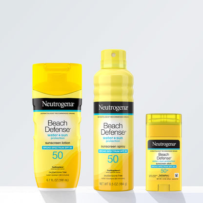 Neutrogena Beach Defense stick held in hand for scale