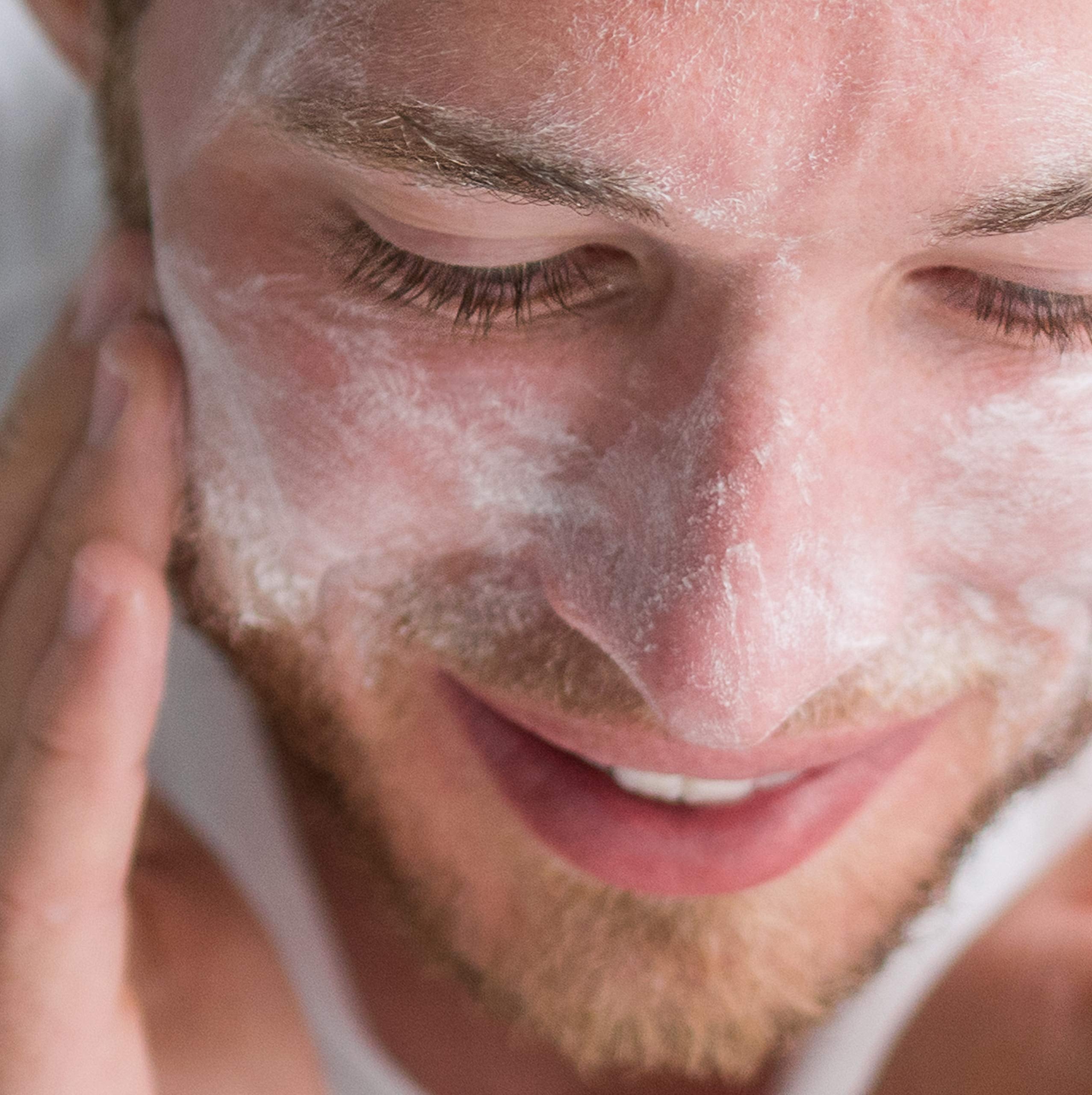 Creamy texture of Neutrogena exfoliating acne face scrub with gentle beads.