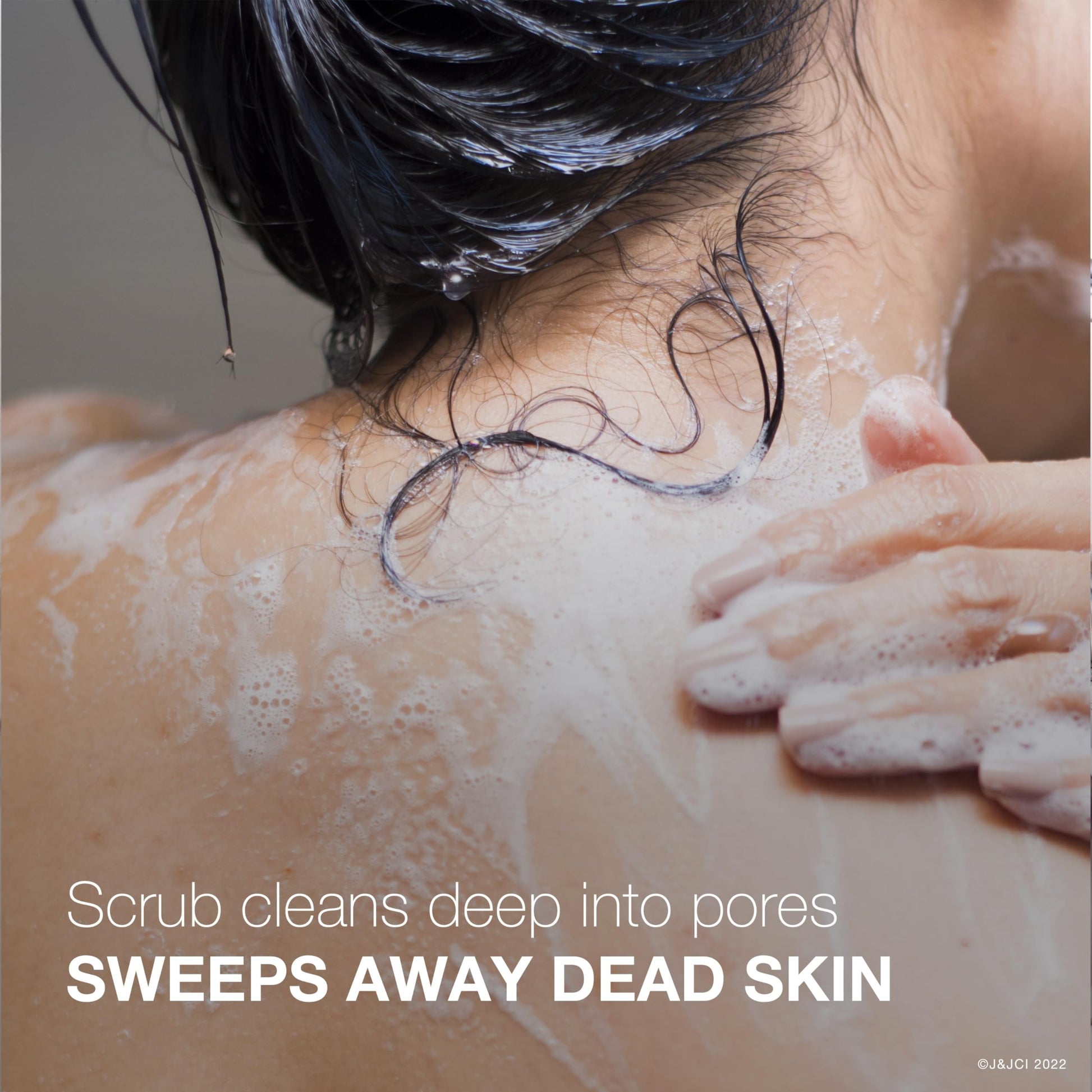 Close-up of the oil-free daily wash packaging demonstrating the microbead-free exfoliating formula.