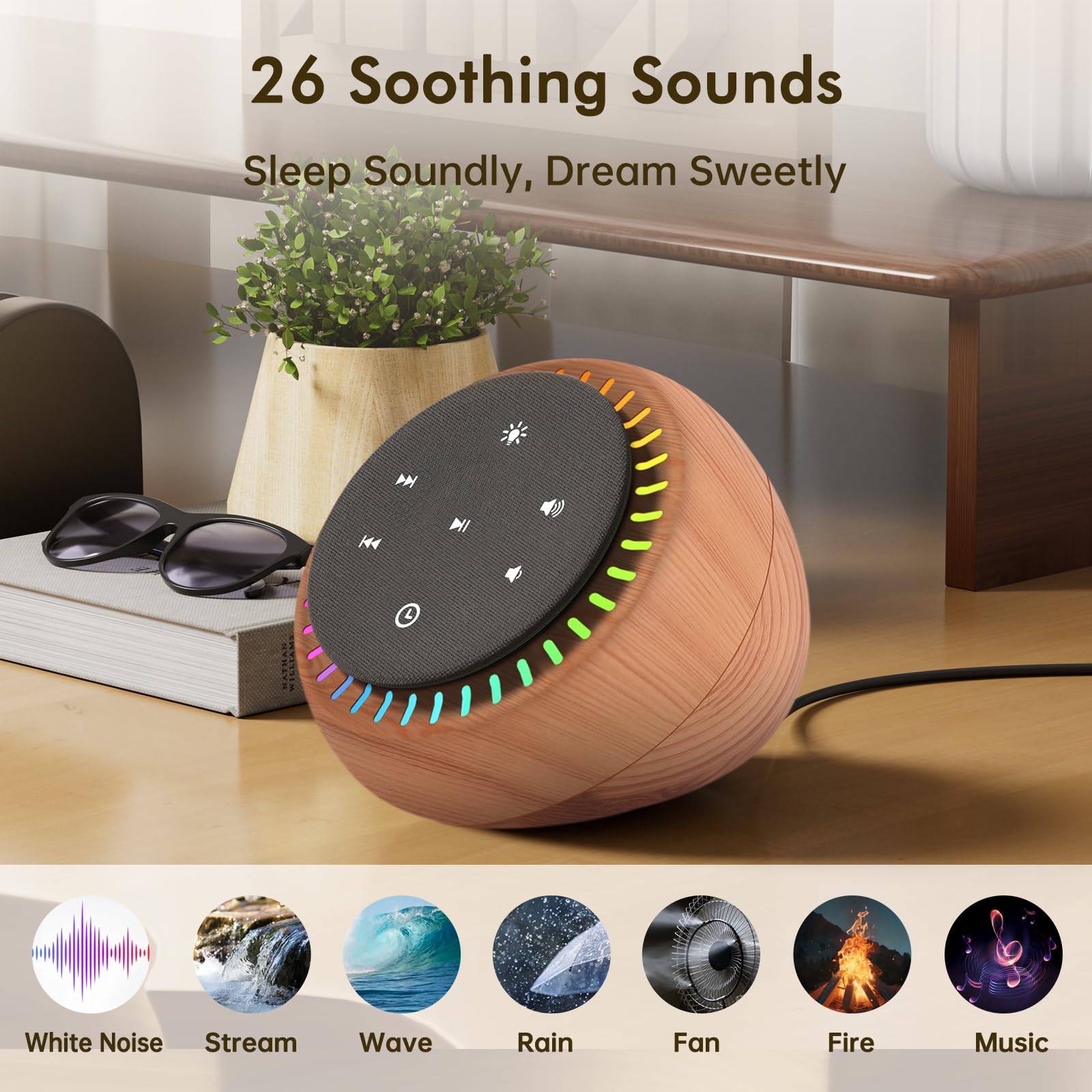 DreamSky sound machine displaying the glowing RGB night light feature in a dark bedroom setting.