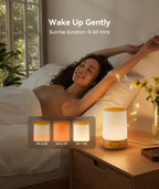 Bedside table arrangement with Dreamegg sound machine glowing in warm yellow