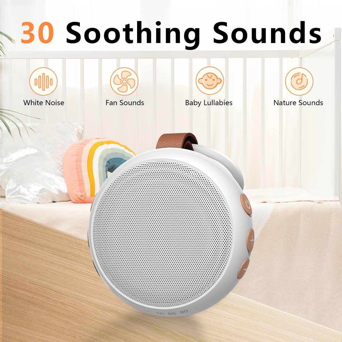 SoundMe travel sound machine attached via its leather strap to a modern baby stroller handle for on-the-go nap time