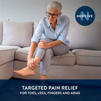 Nervive pain relief spray application on foot
