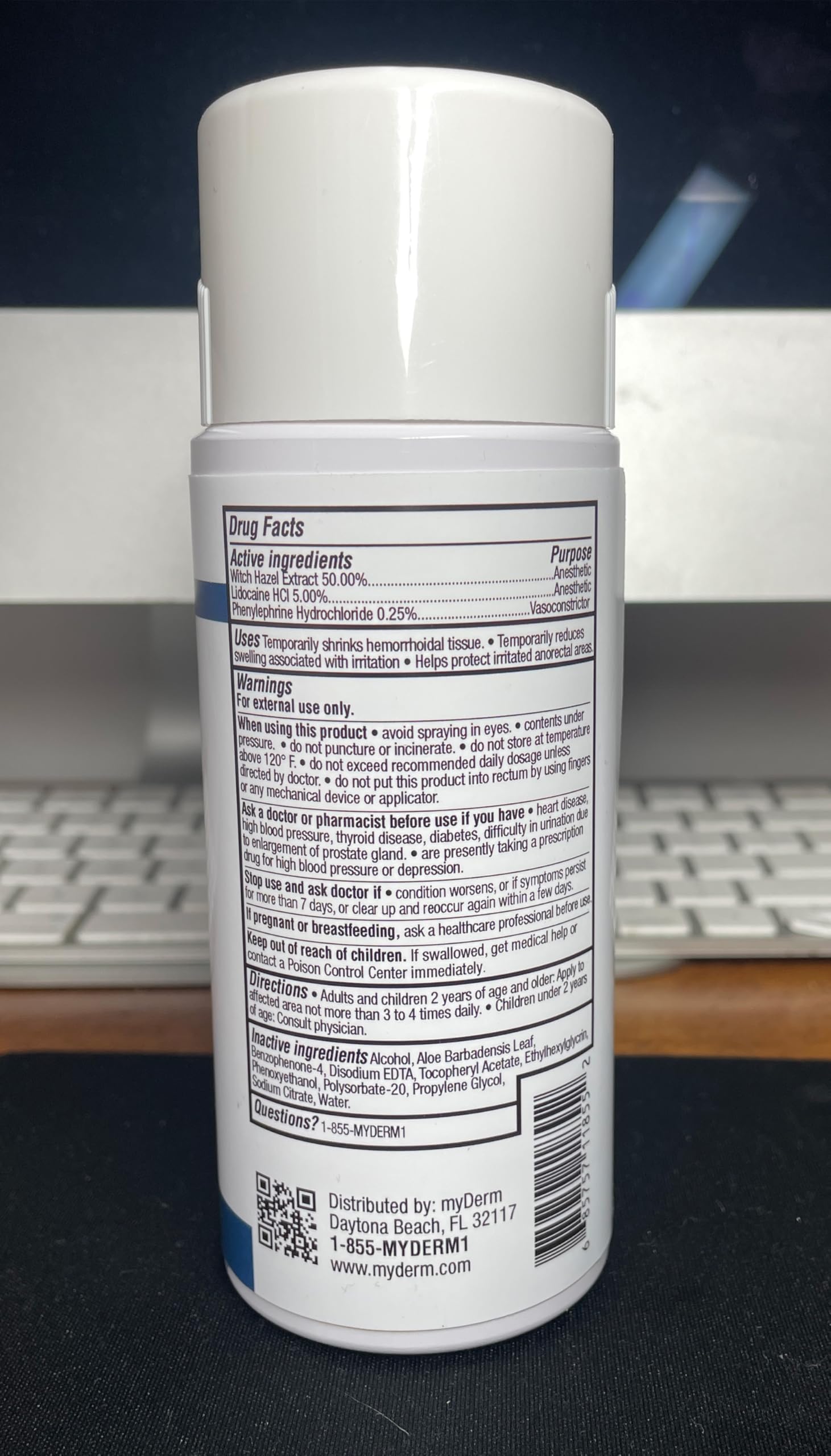 Back of Myderm Medical spray bottle with instructions