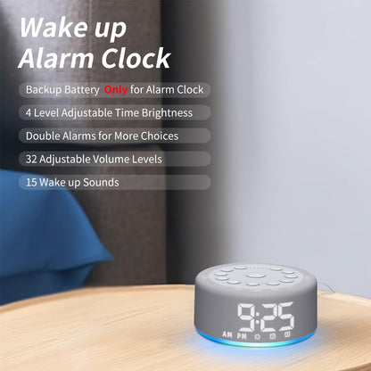 Hushing multi-functional electronic digital clock showing the rear battery backup compartment and power input.