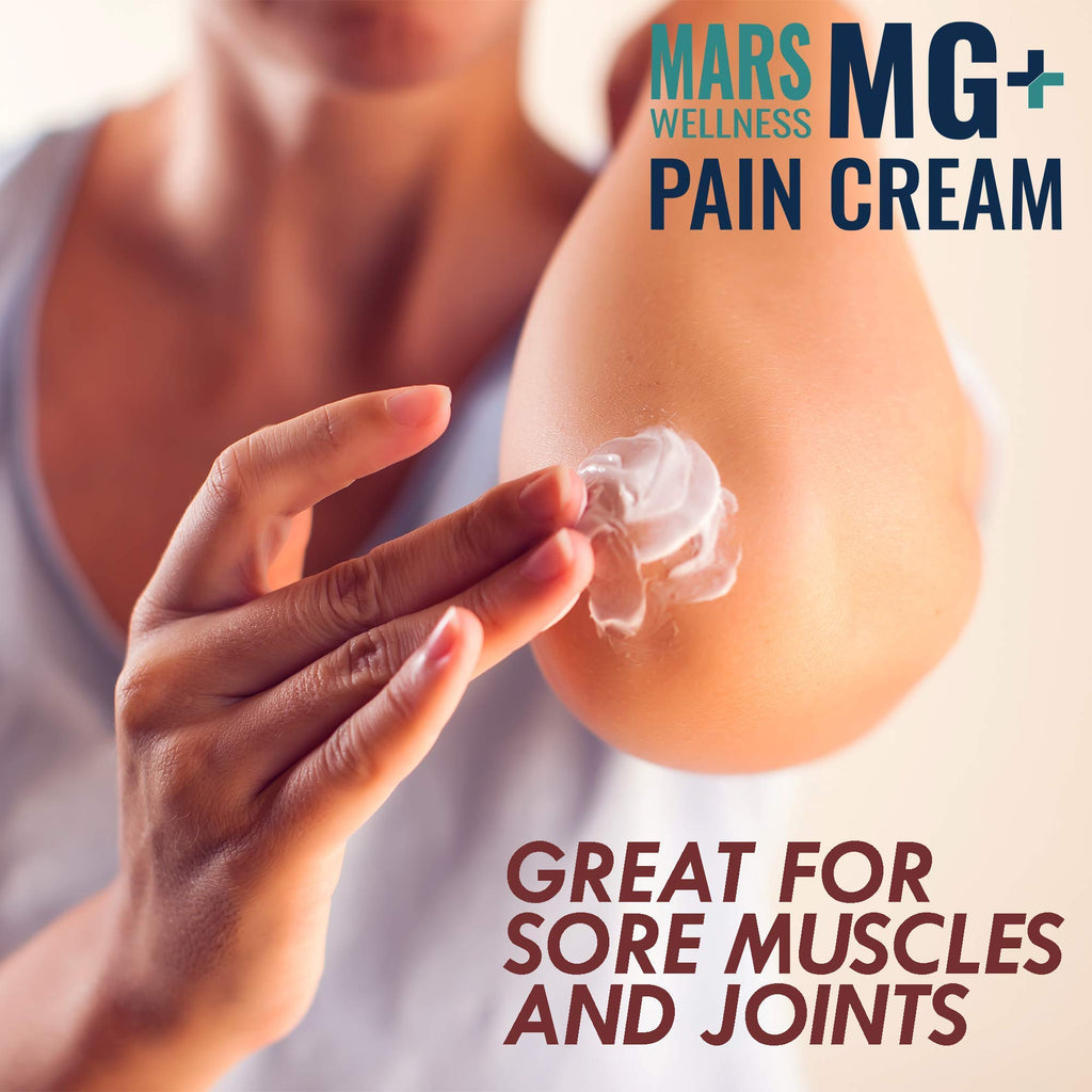 Mars Wellness pain relief cream tub next to fitness equipment