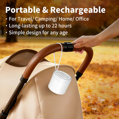 Hushing travel sound machine placed next to a suitcase showing portability packaging