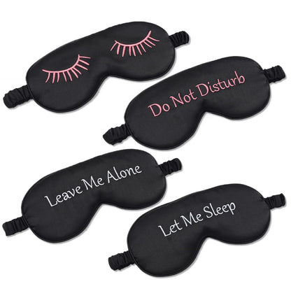 Set of four portable travel eye masks neatly arranged for packing.