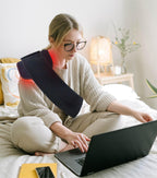Mana LumiHeal Near Infrared Pad positioned for back and waist muscle recovery.