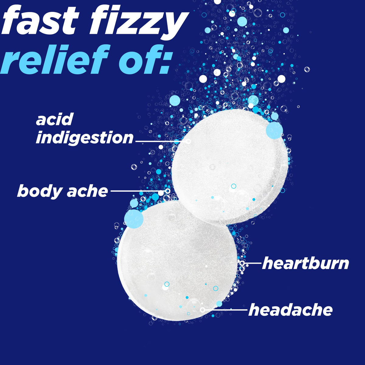 Alka-Seltzer effervescent tablets dissolving in water glass