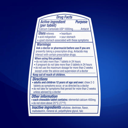 Open bottle of Tums Ultra Strength chewable tablets showing tablet texture