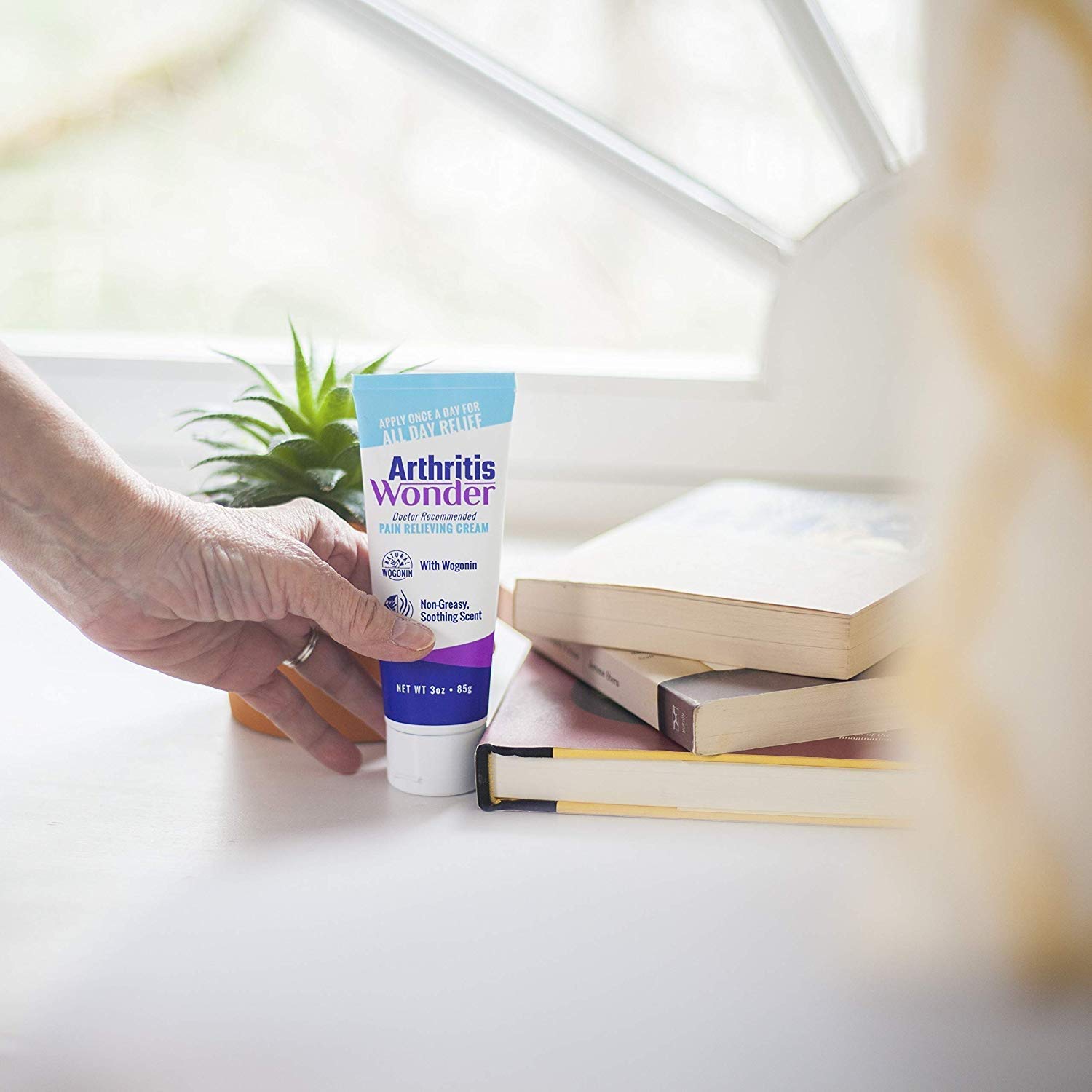Arthritis Wonder fast acting non greasy cream pack being unboxed for Indian joint care consumers