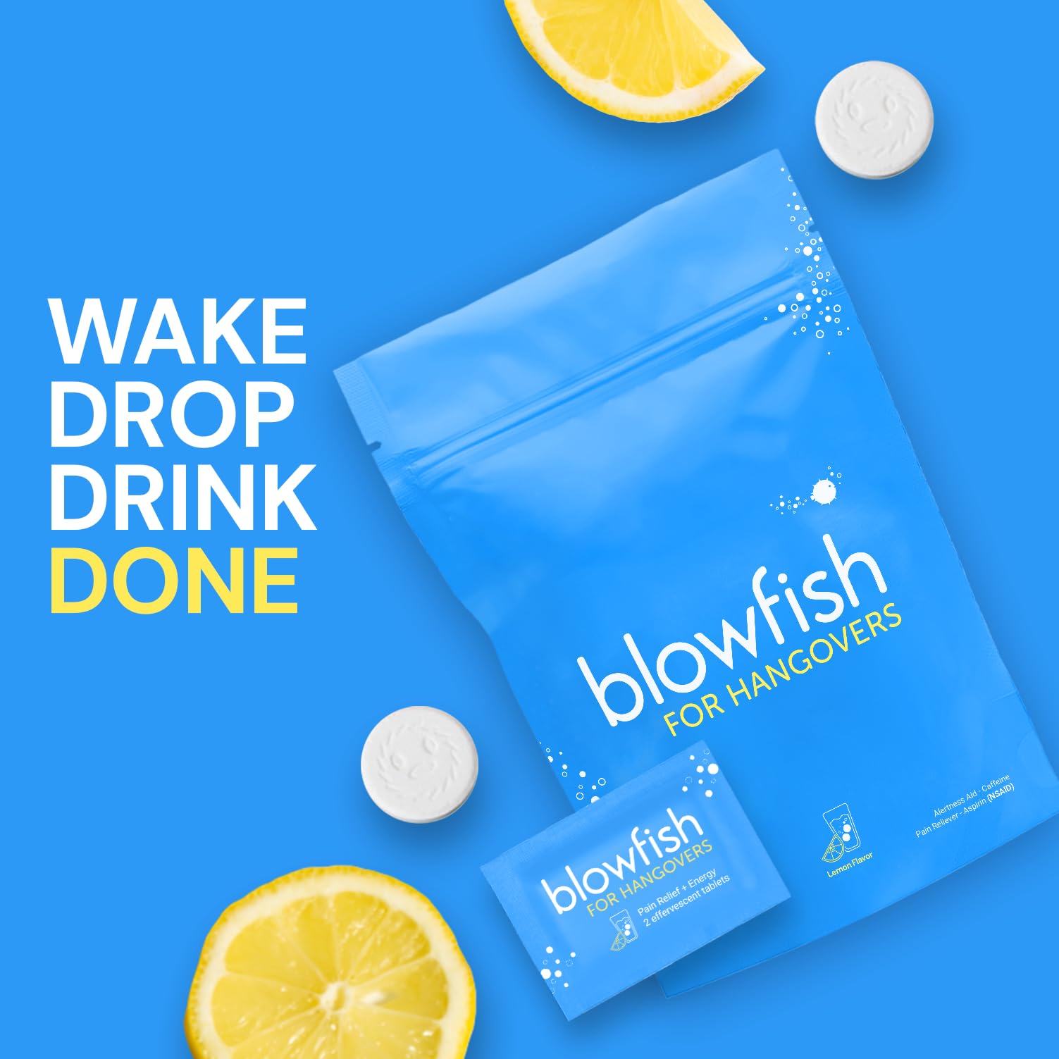 Close up of two white Blowfish effervescent tablets ready for hangover symptom relief