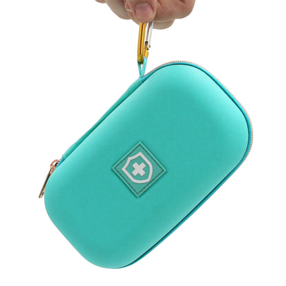 CASEMATIX compact medicine carrier being attached to a travel backpack using the sturdy metal clip