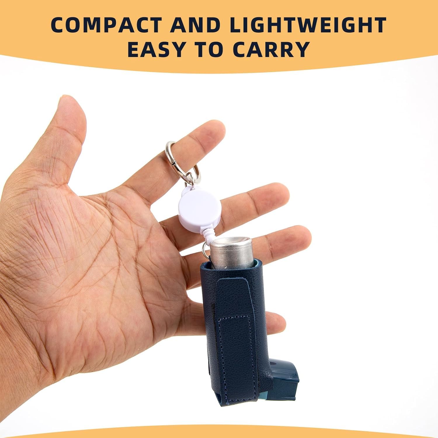 Blue portable leather inhaler case with carabiner clip attached to a travel bag
