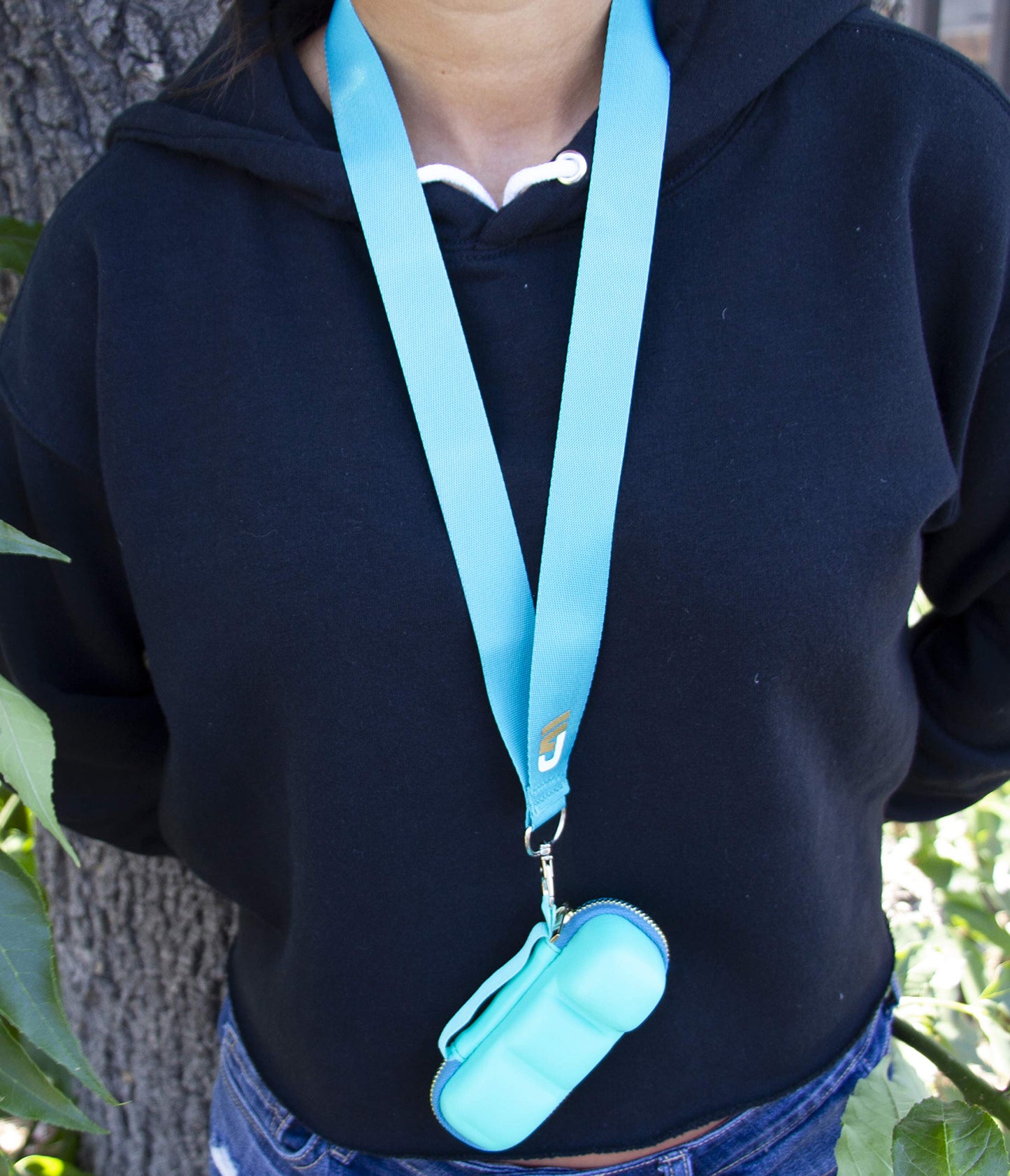 Turquoise blue medical pouch with detachable neck lanyard accessory for quick access while hiking