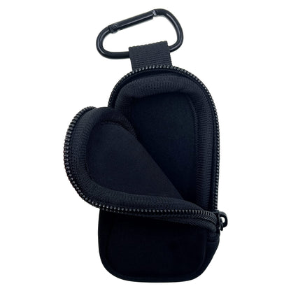 Compact asthma inhaler travel sleeve clipped onto a travel backpack zipper
