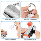 Silver glitter asthma inhaler pouch attached to a school backpack zipper loop