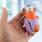 Compact keychain inhaler sleeve showing small portable dimensions for school and everyday use.