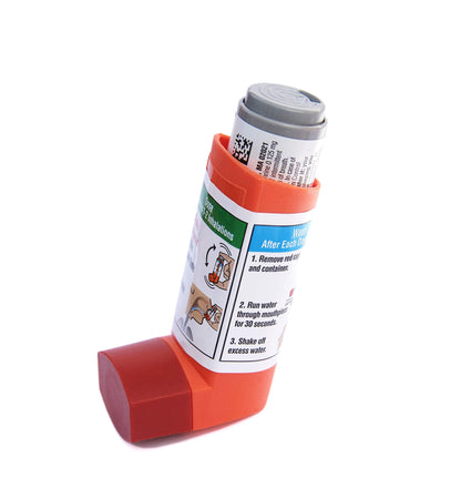 Primatene Mist 0.125 mg epinephrine oral inhaler close up showing ingredient label
